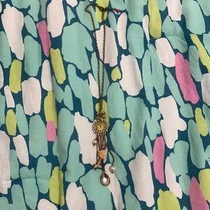 Woman’s clock necklace, pink and fake gold